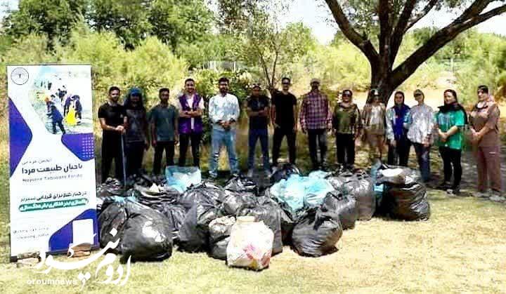 پاکسازی حاشیه رودخانه باراندوز با مشارکت مردمی